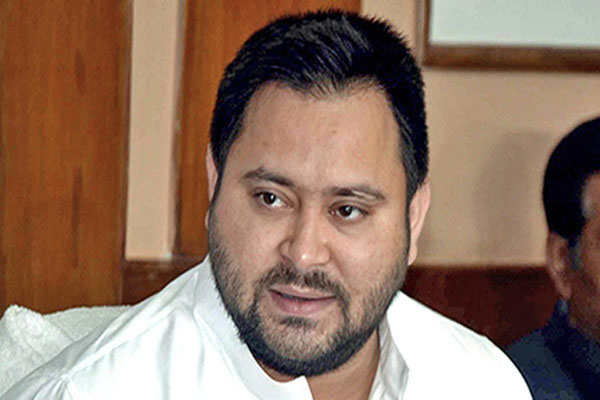 tejashwi yadav calls assam cm himanta ‘chinese version of yogi’ over decision to end jumma break bjp terms it ‘racist